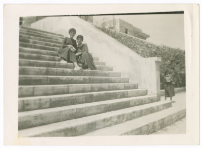 A girl from Abu Ghazalh Family with her friend; from Abdel-Haq Family, sitting at the stairs of al-Aysheya School in Nablus