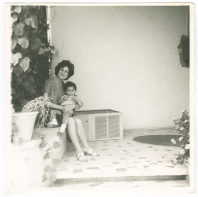 A woman from Abu Ghazaleh hugging her nephew
