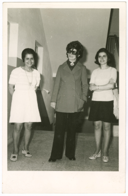 A woman from Abu Ghazaleh Family with her students at a school in Nablus