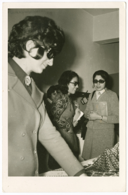 A woman from Abu Ghazaleh Family at an exhibition in Nablus
