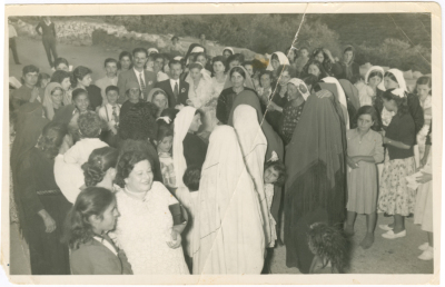 Women in traditional dresses at a wedding