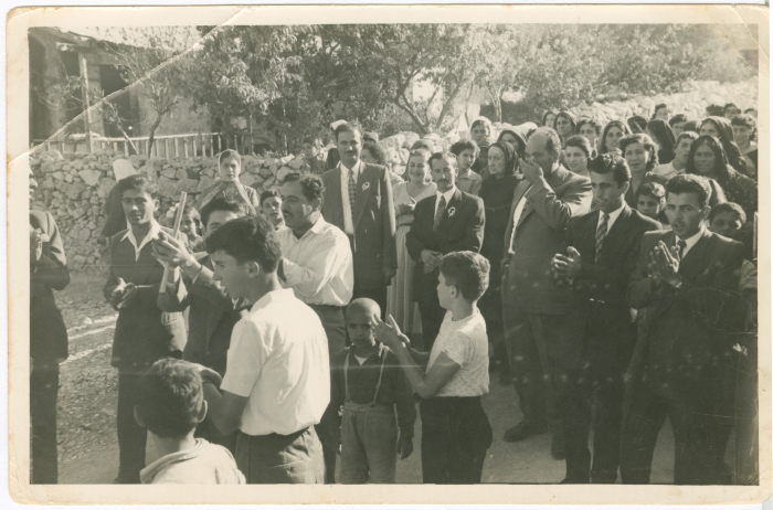 Men during a Zaffa; a celebration before the actual wedding