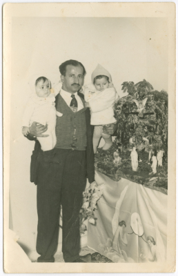 A father and his daughter with a relative