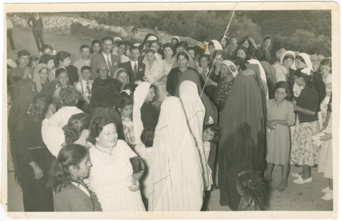 Women in traditional dresses at a wedding