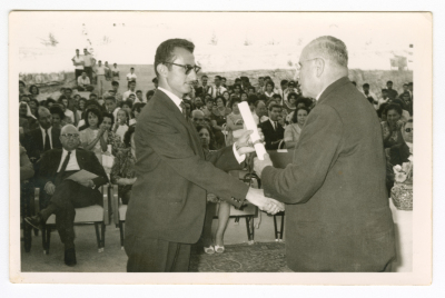 A man receiving a certificate