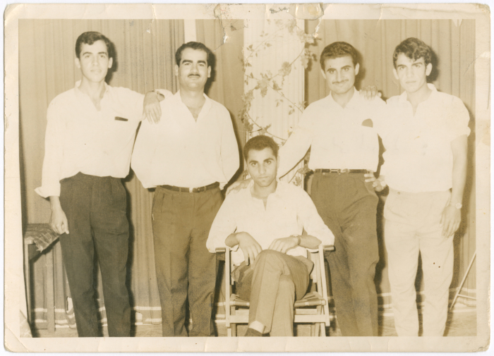 Mohammad Abu Farha with his friends in a studio