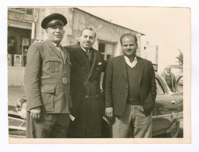 A Man, An Administrative Governor, And A Policeman At Al-Manarah Square
