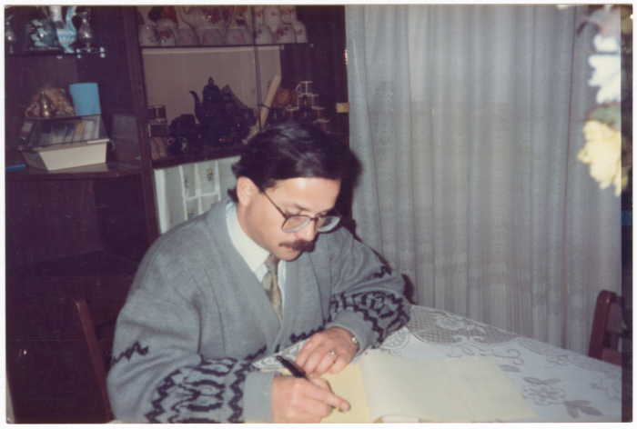 A Palestinian poet from Risha Family as he writes poetry