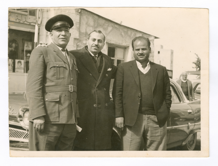 A Man, An Administrative Governor, And A Policeman At Al-Manarah Square