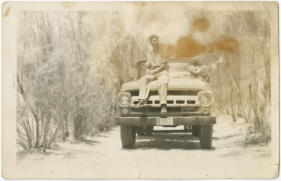 A man in front of a car in Kuwait