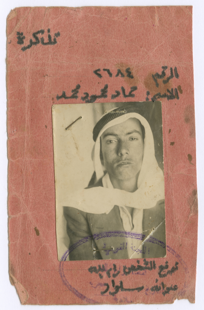 A documant; with a photo of a member of the National Committee