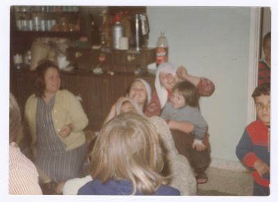 Women celebrating the graduation of a relative from the University of Jordan