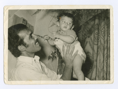 A Man Playing with a Child