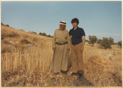 رجلان في أراضي قريتهم