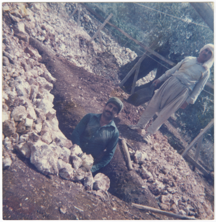 Men building a house