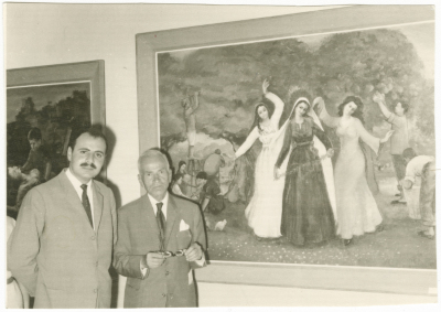 Two men at an art exhibition
