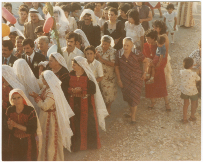 Men and women during a Zaffa; bringing the bride from her father's house to her husband's