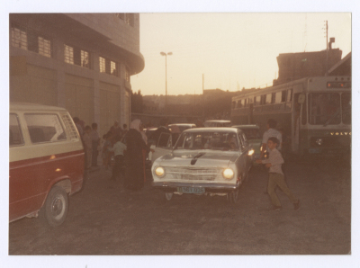 A photograph taken during a ceremony; giving away the bride, in Hebron