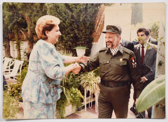 The Late President Yaser ʿarafat and the Fighter Najla' Yassin.