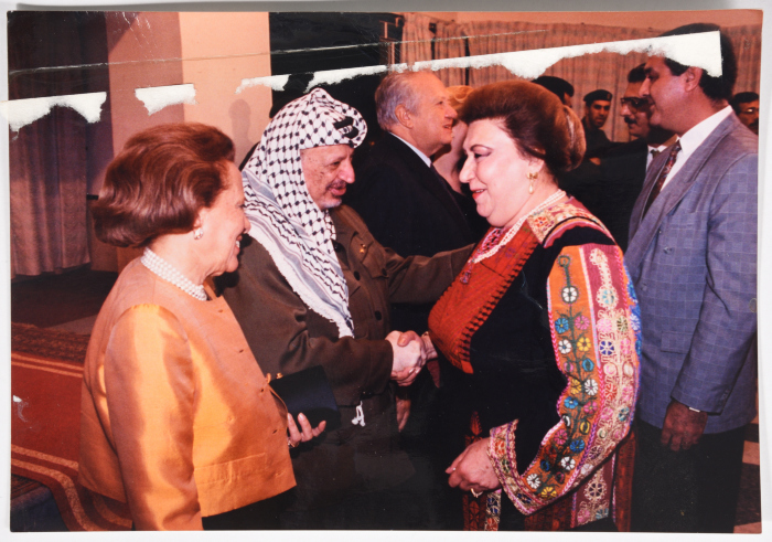 The Late President Yaser ʿarafat and the Fighter Najla' Yassin.