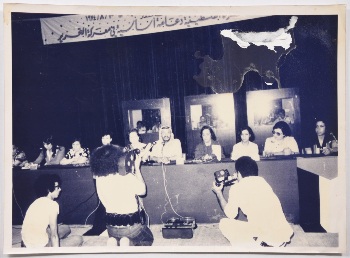 Abu Ammar in a conference on supporting women.