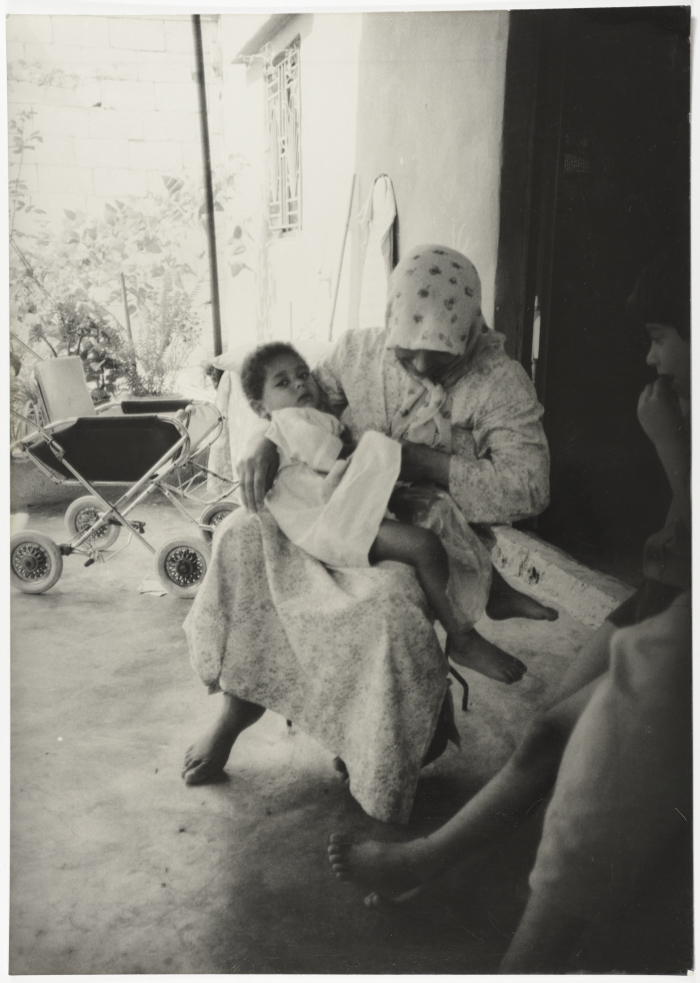 ِA Woman and Two Children in a Palestinian Refugee Camp, Lebanon 