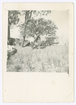 Siblings in front of their house in Silwad Village