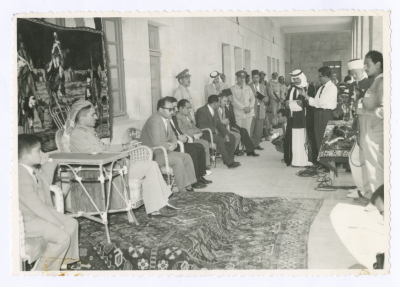 A man giving a speech in Hebron; with the presence of King Hussein I