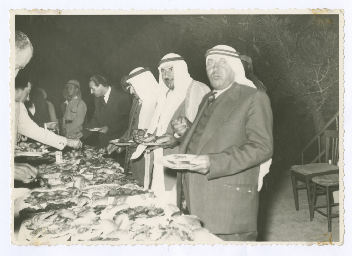 People meet lunch invitation in honor of Hazza' Basha 