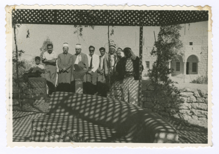 Legal persons  under the pergola at the house of the Sheikh of the Ta'amreh Family