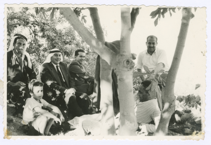 Men with a child in Artas