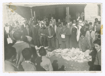 A man giving a speech on Arbor Day
in front of a delegation; on their visit to the Mental Health Hospital/Bethlehem