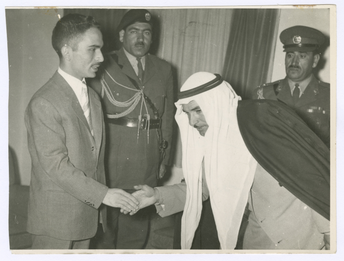 A man bending the knee to the King of Jordan