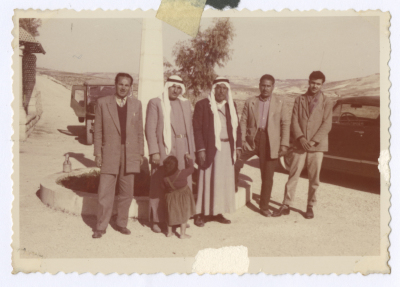 Friends in front of the house of the Sheikh of the Ta