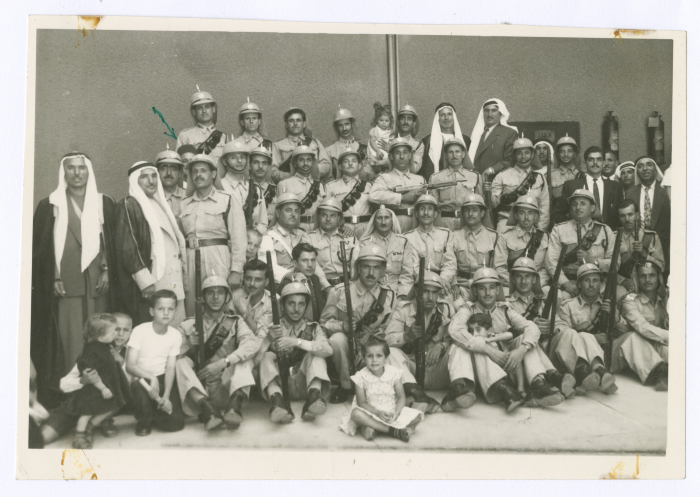 Men and police officers during Eid al-Adha