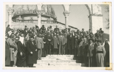 A Photograph of the Jordanian House of Representatives in Front of the Dome of the Rock 