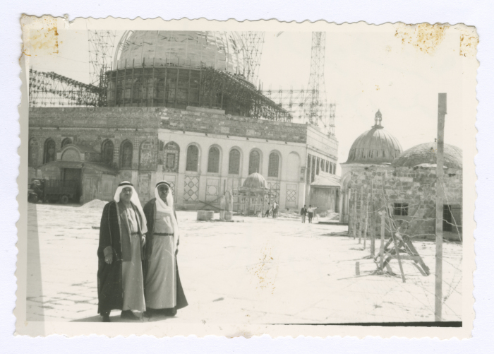 Men in front of the Dome of the Rock; being painted with gold