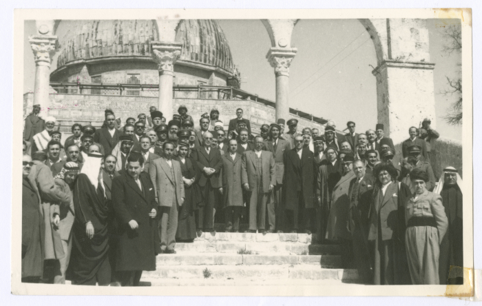 A Photograph of the Jordanian House of Representatives in Front of the Dome of the Rock 