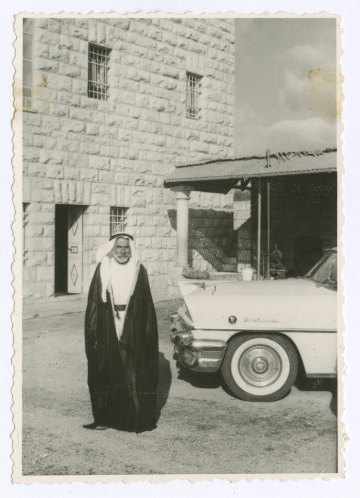 A man at the house of the Sheikh of the Ta'amreh Family