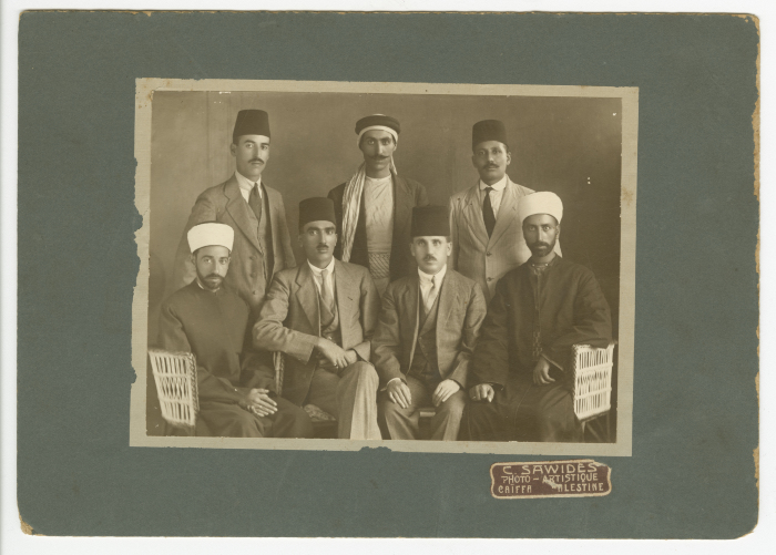 Abdel Salam Al-Barqawi; standing first to the left, with other political figures