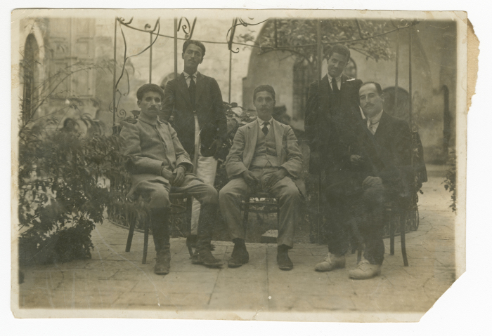 Abdel-Salam al-Barqawi; seated first to the right, with other political figures