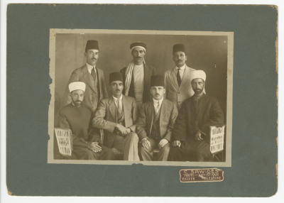 Abdel Salam Al-Barqawi; standing first to the left, with other political figures