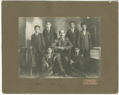 Abdel-Salam al-Barqawi with the children he; with the help of others, adopted their education