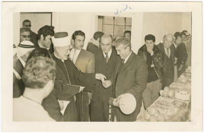 Men during the reopening ceremony of Hebron Youth Club