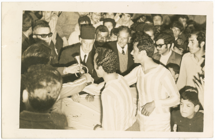 A football player receives the cup