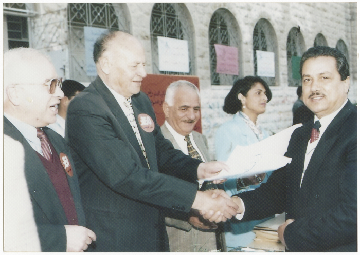 A man receives a certificate; upon proving his merit