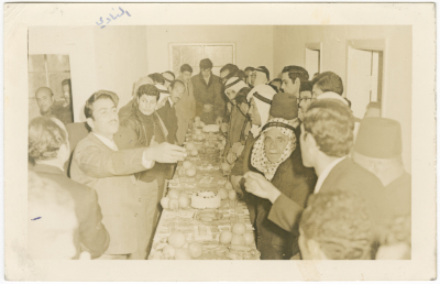 Men during the reopening ceremony of Hebron Youth Club
