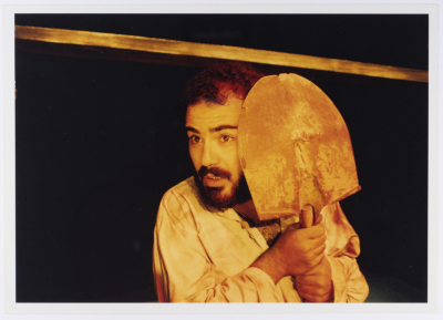 A Photograph of Amer Hlehel on Stage During the Theatrical Performance of 