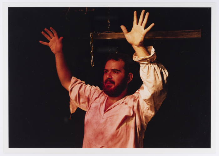 A Photograph of Amer Hlehel on Stage During the Theatrical Performance of 