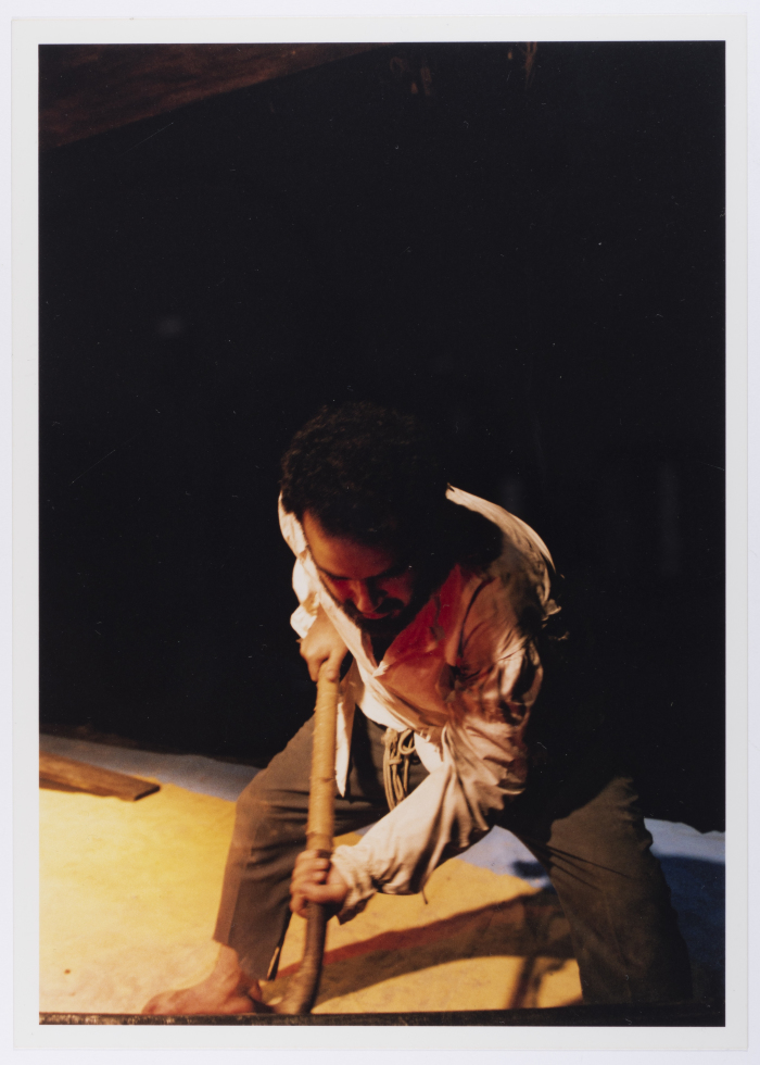 A Photograph of Amer Hlehel on Stage During the Theatrical Performance of 